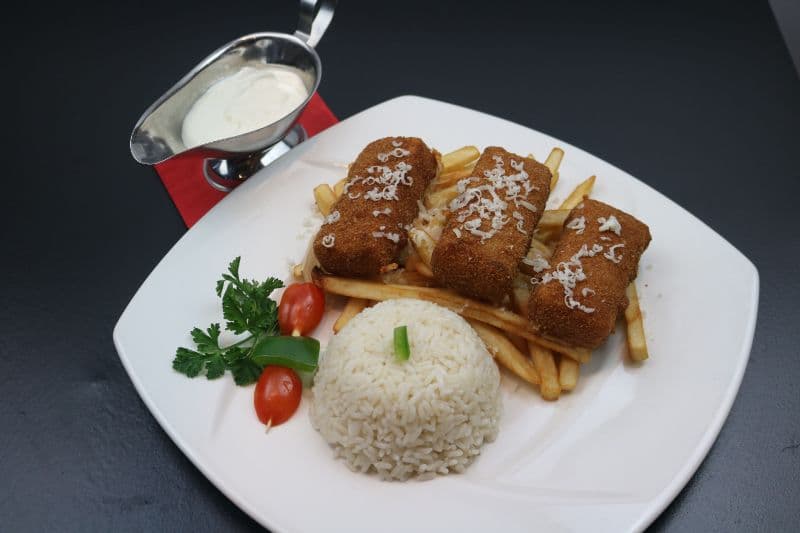 Breaded Cheese with French fries, rice and tartar sauce.