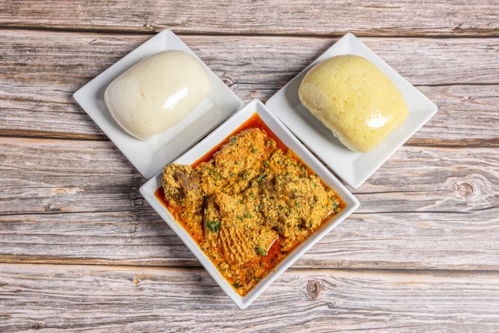 Egusi Soup (Assorted Meat) and Poundo Yam (Fufu) with Yellow Garri