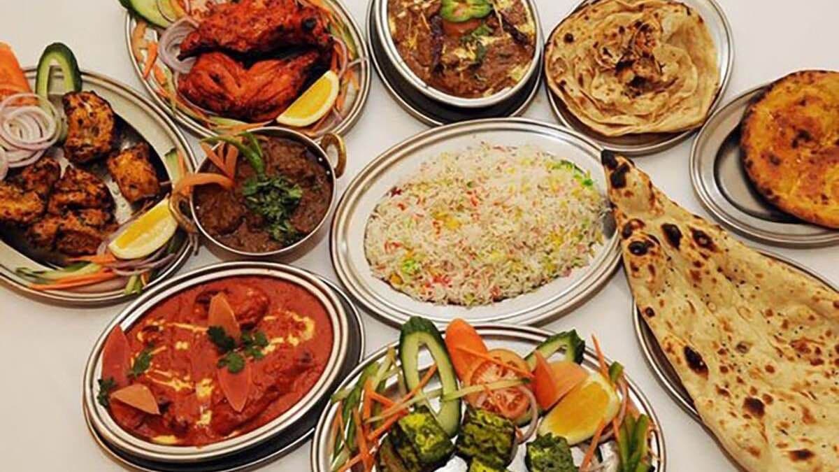 Any 2 Large Indian dishes + 8Naan + Green Salad