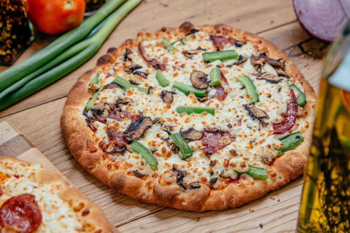 9 Pizza "14" Toute Garnie