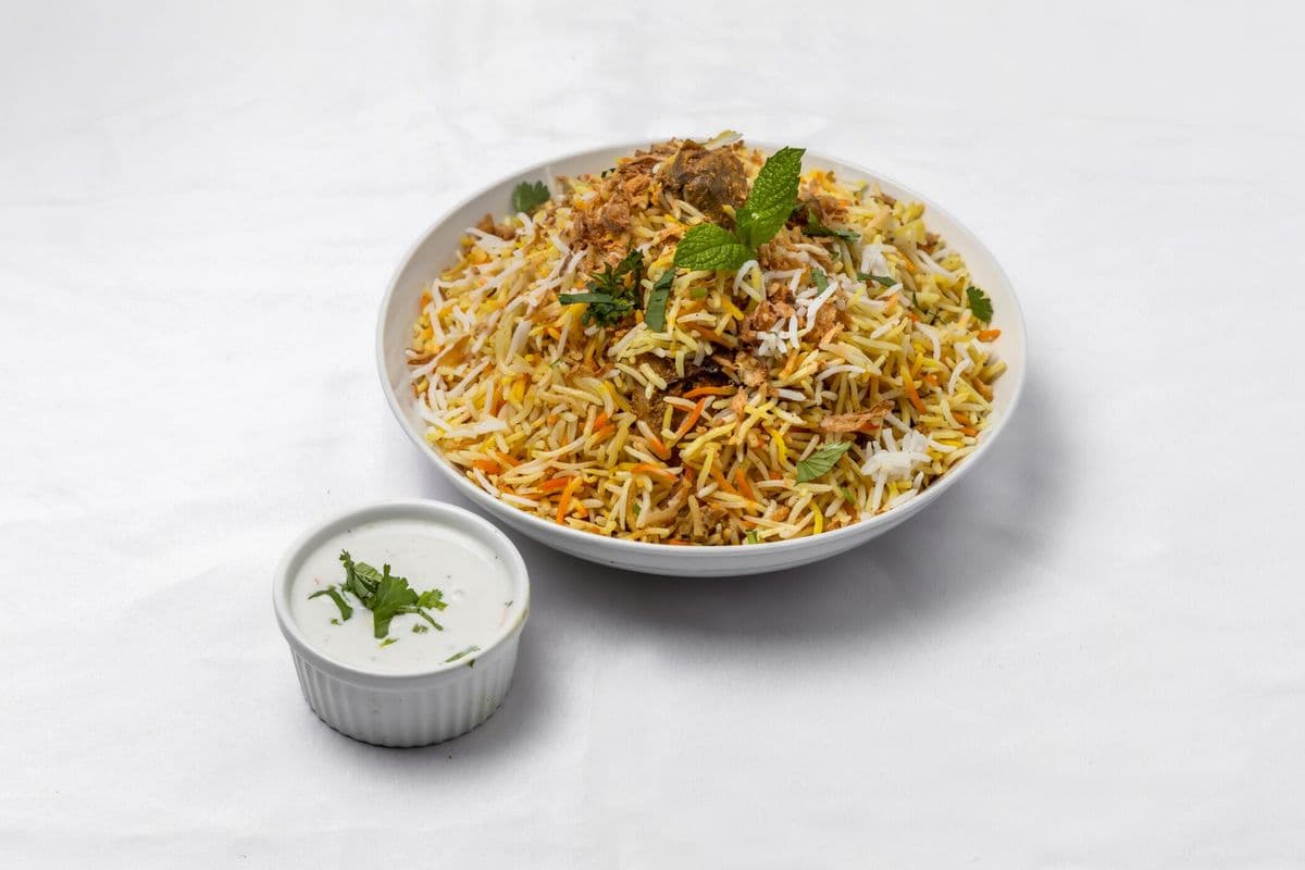 Chicken Biryani with coke can