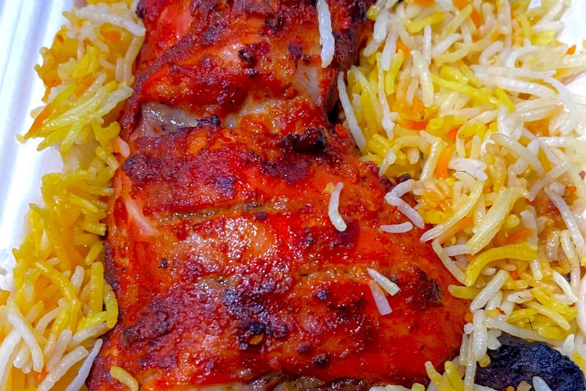 Chicken leg quarter with biryani rice