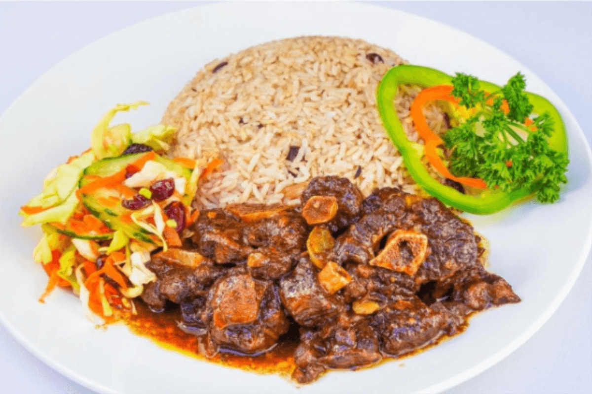 Oxtail Served with Boiled Rice and Peas