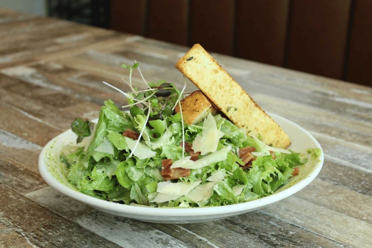 Starter Caesar Salad / House Greens (Gluten Conscious with Modifications | Cross contamination will occur)