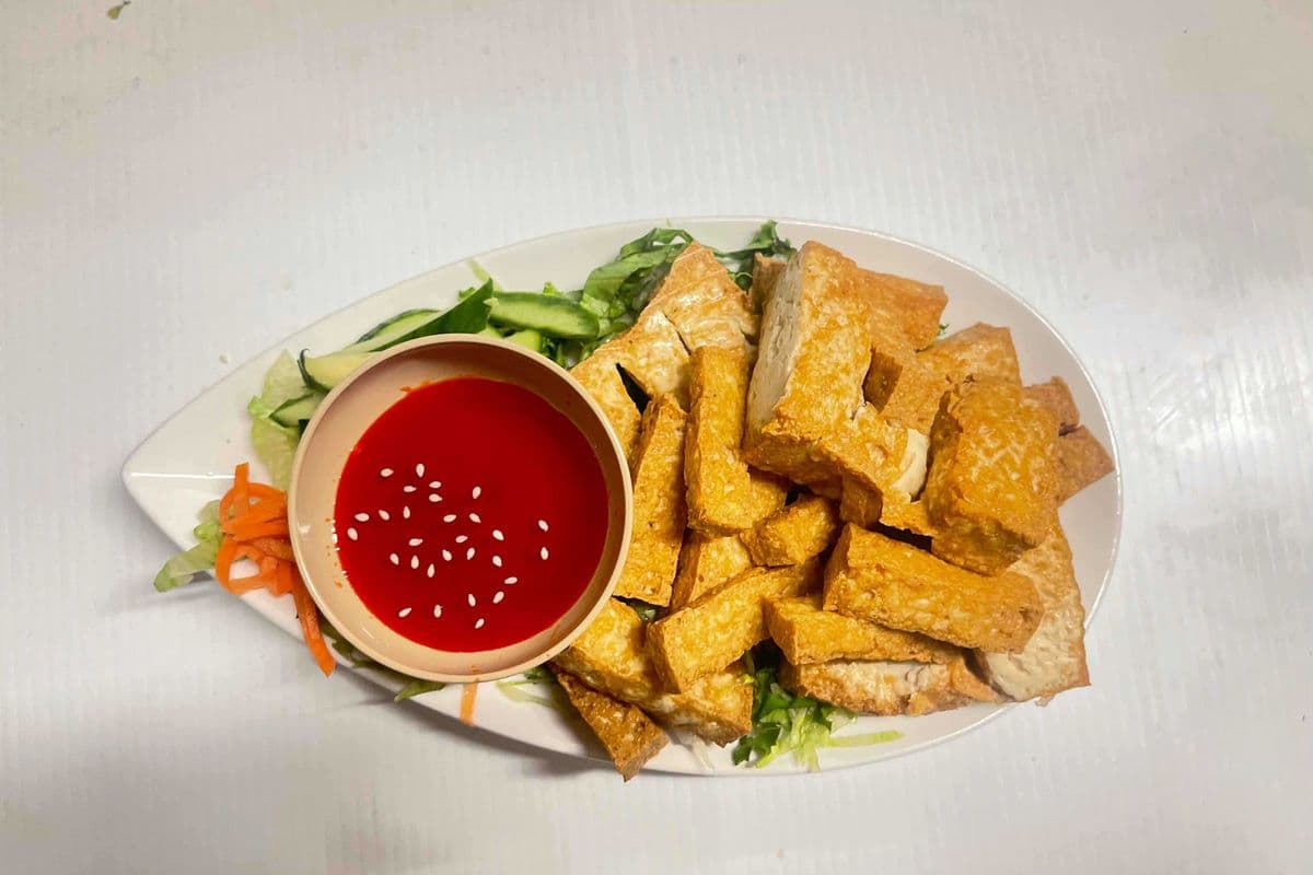 Fried Tofu with Sweet & Sour Sauce (lettuce, carrot, cucumbers)