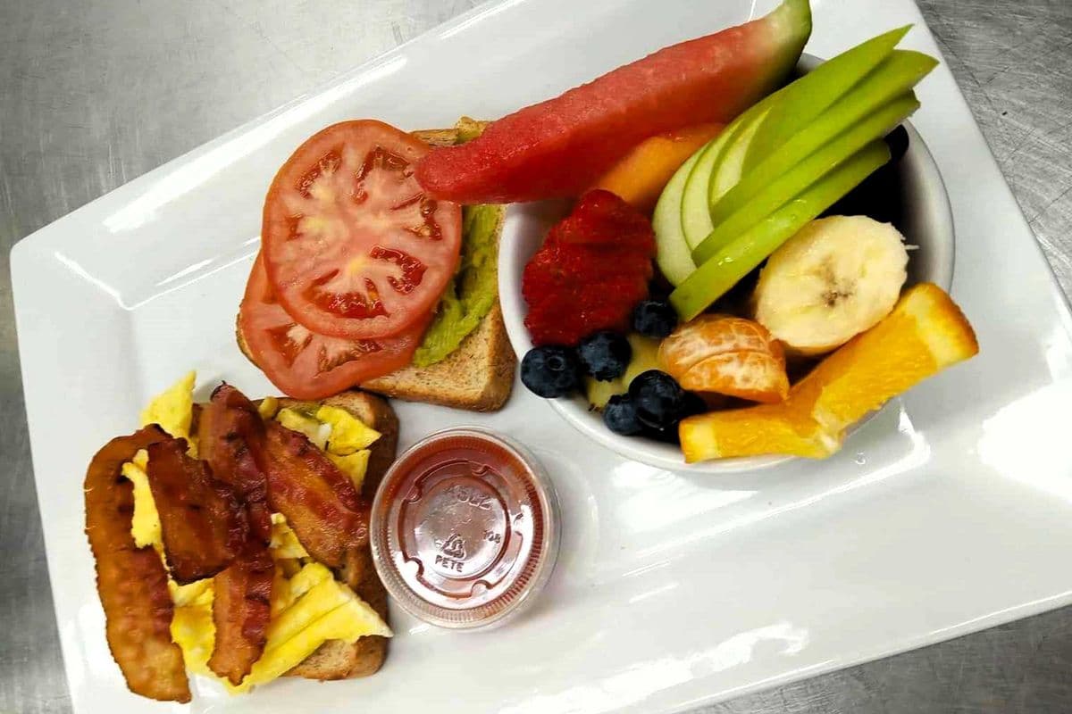 Mashed Avocado Toast, Scrambled Eggs & Fresh Fruit