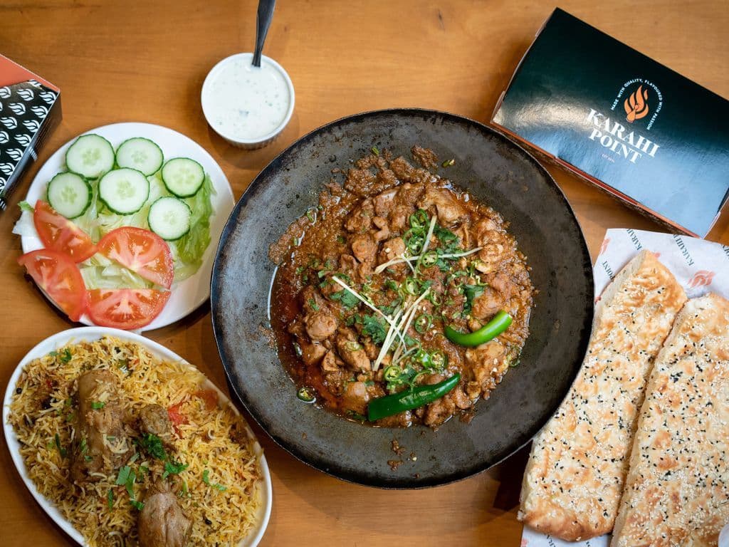 Combo 1(Half chicken karahi, 2 nan, chicken biryani, 2 pop)