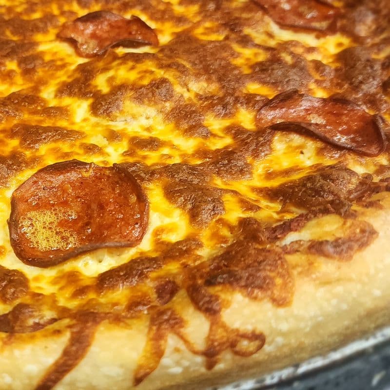 2x 12" Pizzas of your Choice + 10 Wings & 2L Pop