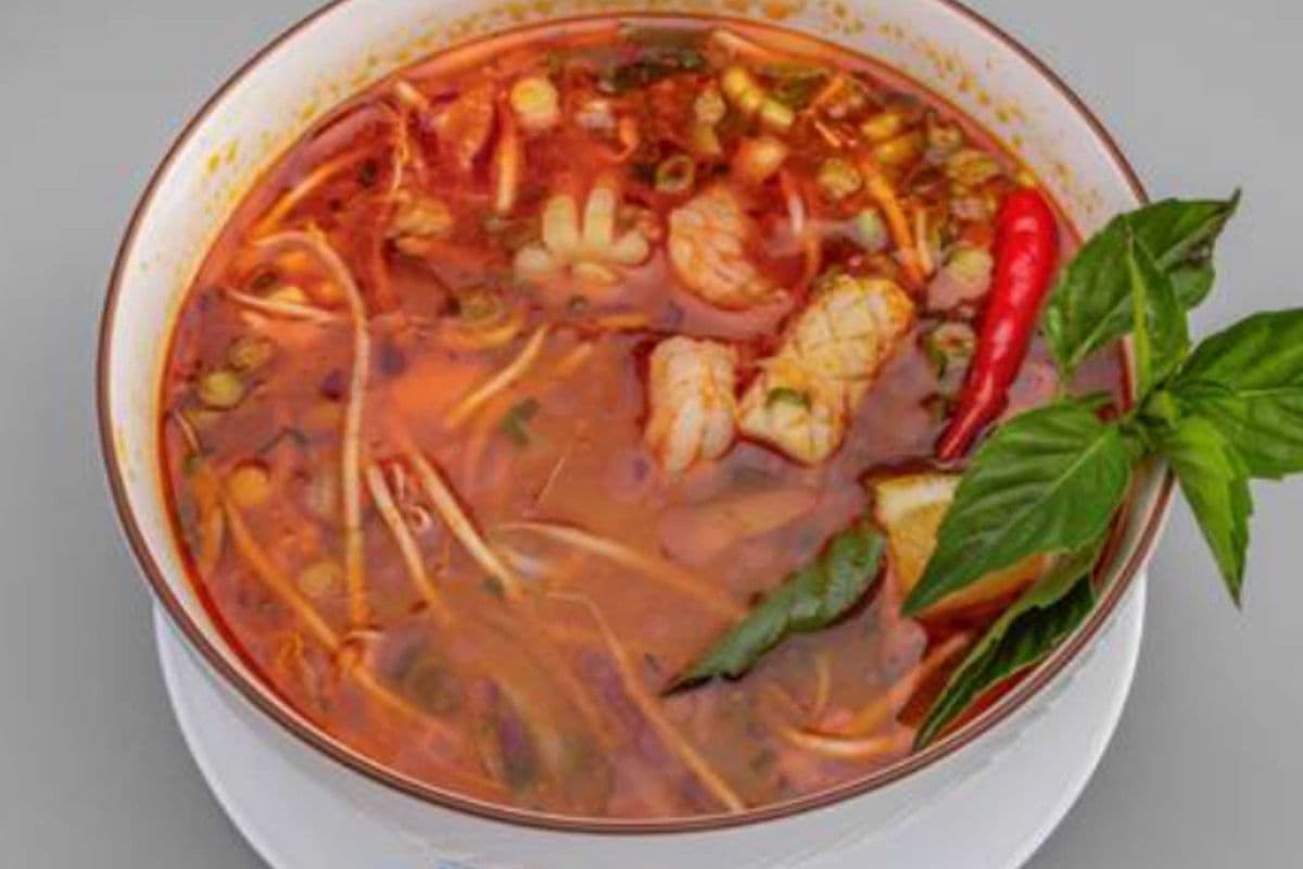 P60. Coconut Peanut Satay Seafood Noodle Soup