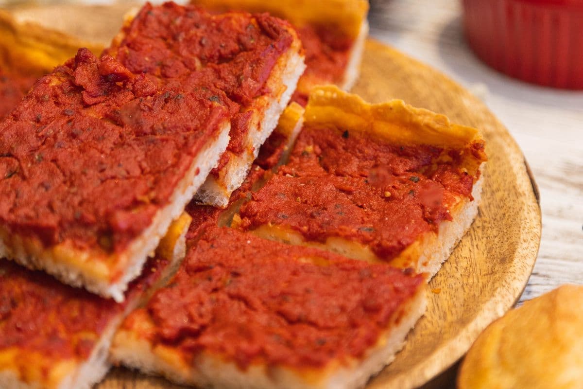 Pizza un demi aux tomates