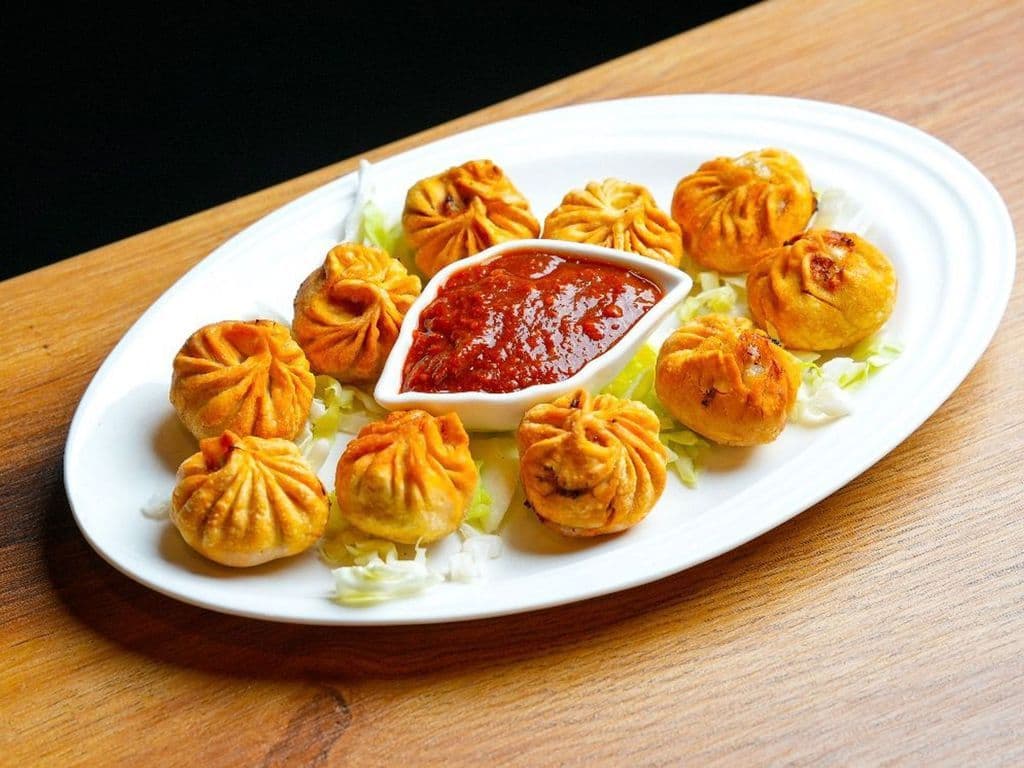 Deep Fried Momos -9pcs (Veggie/Paneer/chicken)