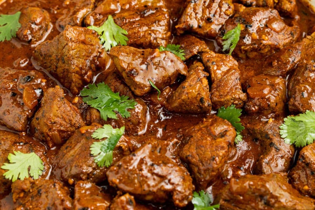 Beef Vindaloo with garlic naan