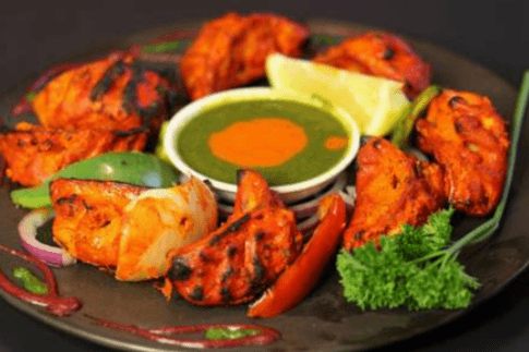 69. Tandoori Chicken Momos ( 8 pcs)