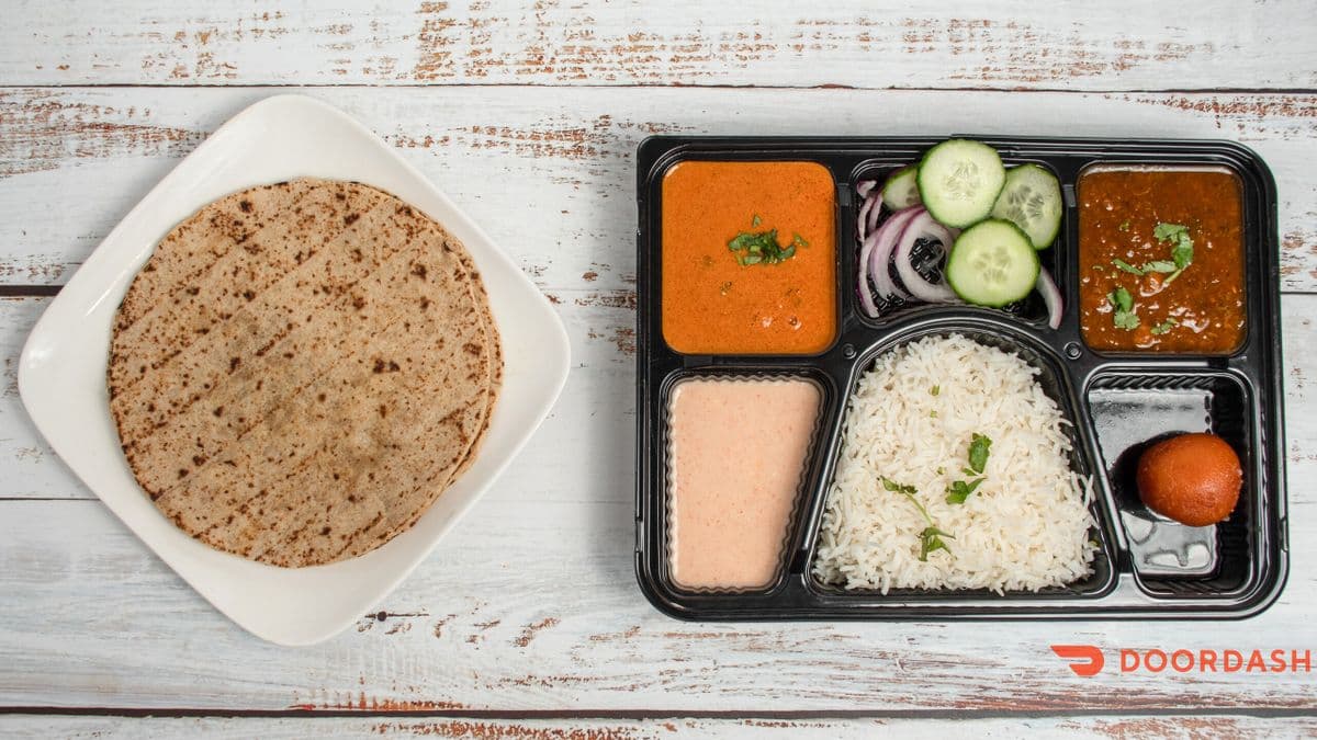 Veg Thali - 3 Curries,2 Roti, Rice, Salad, Sweet