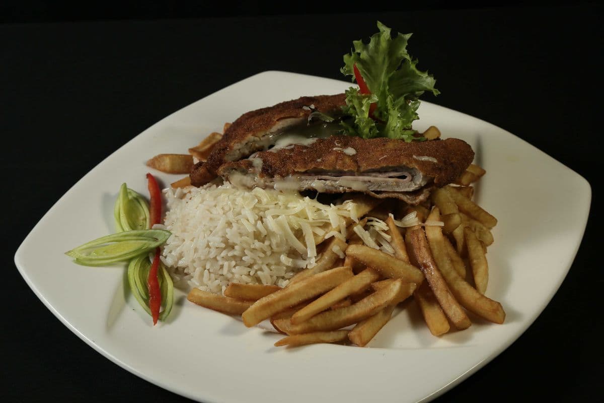 Breaded Pork Chop Filled with Smoked Cheese and Ham
