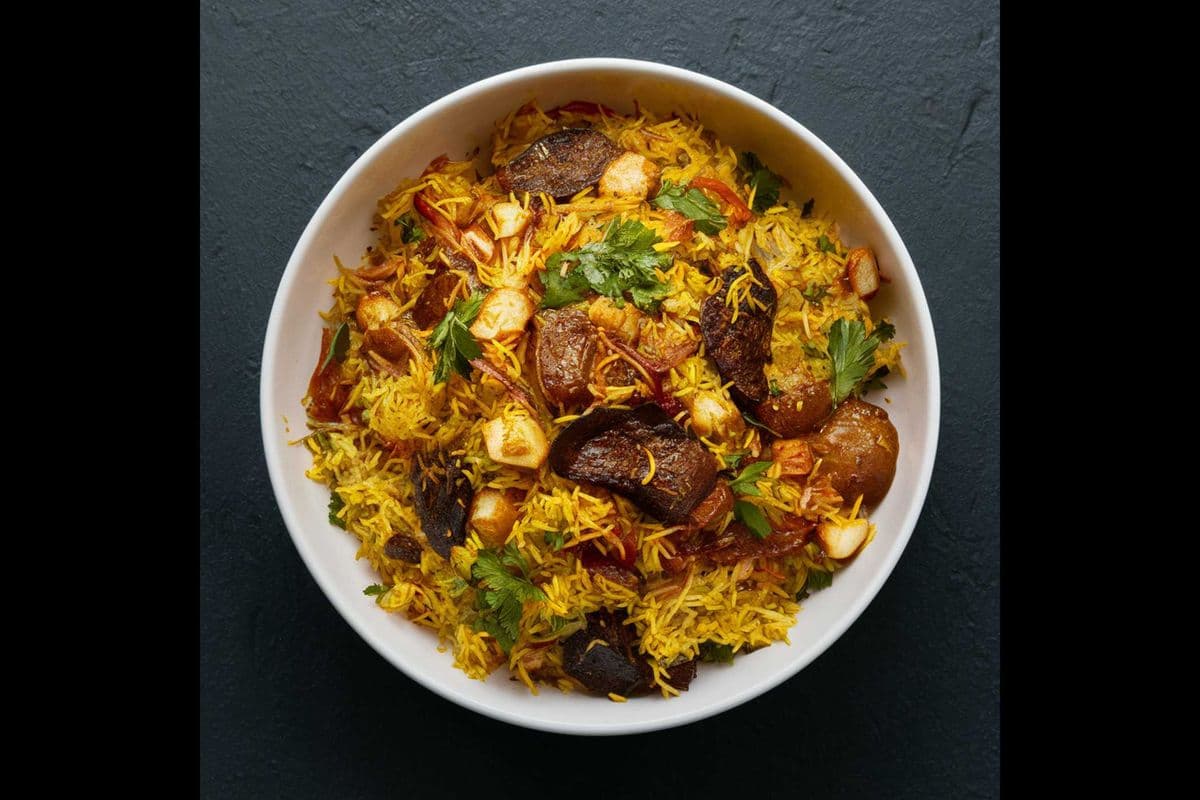 Goat Biryani with coke can