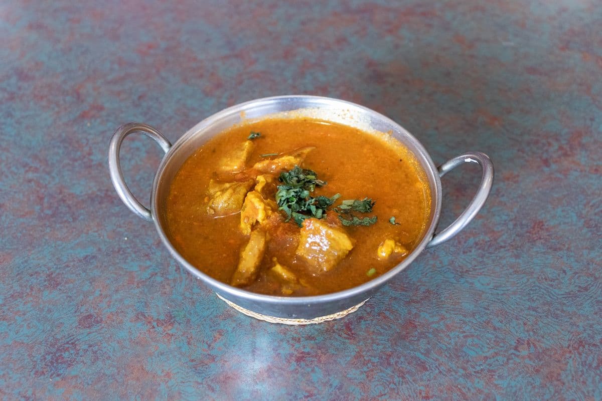 25. Bombay Garden Special (Hot chicken curry-boneless)