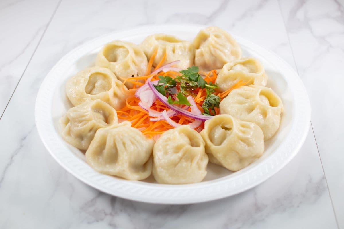 23-C. Chicken Steamed Momo( 10 pcs)
