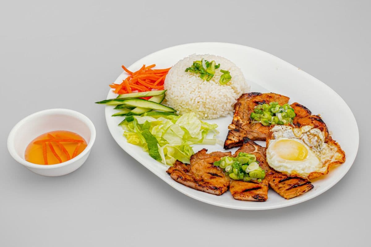 R2. Grilled Pork Chops (Two pieces) and Egg (One Piece) on Rice
