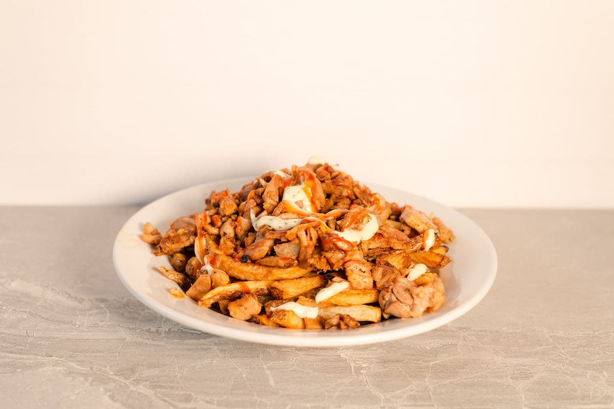CHICKEN ON FRIES W/CAN POP BOGO