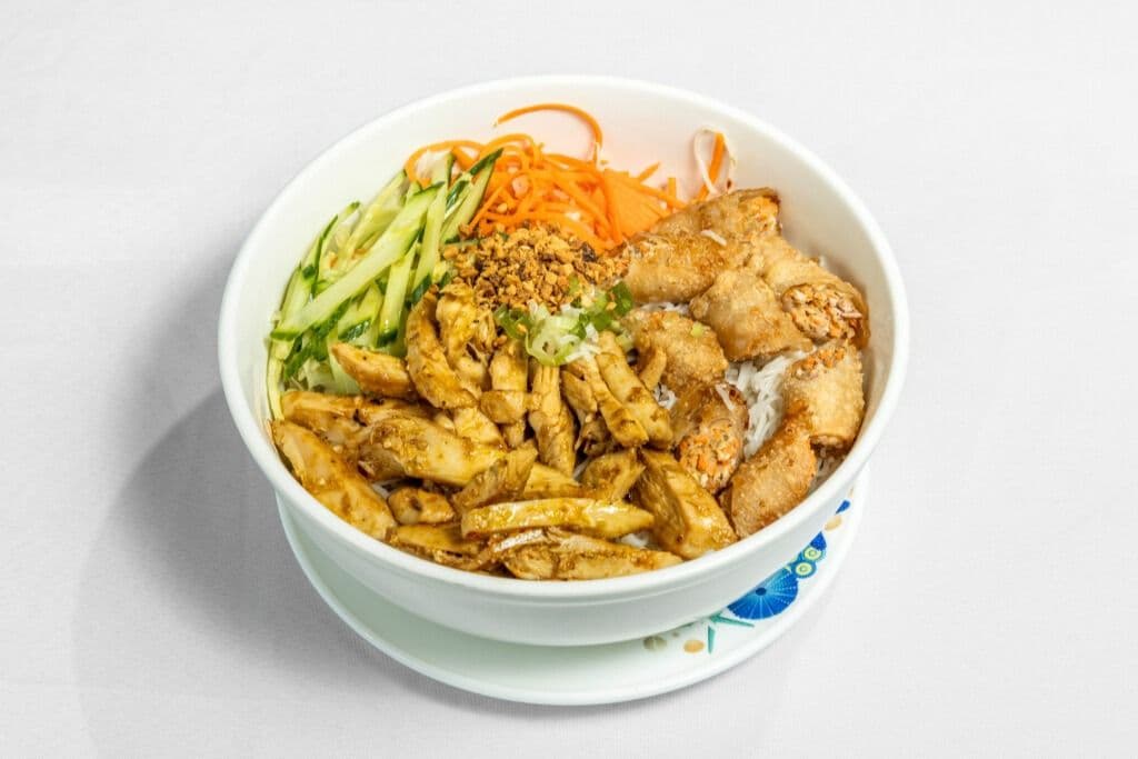 B32. Spicy Deluxe XL Bowl ( 2 spring rolls, Shrimps, Satay Beef, and Chicken)