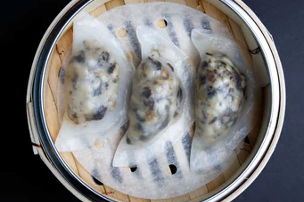 10. Mushroom with Black Truffles Sauce Dumpling