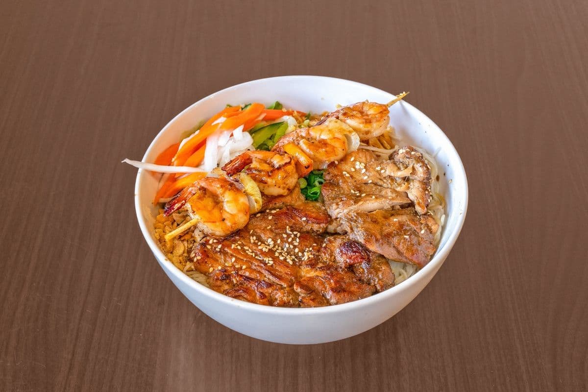 50 Marinated, Grilled Lemongrass Pork Slices or Chicken & Prawn with Veggie