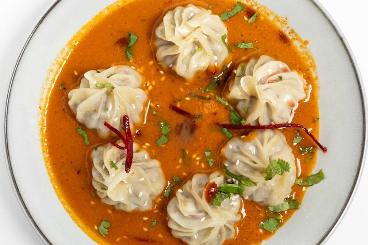 Jhol Momo (momo Dipped in tomatoes and sesame seed based broth) - 8 Pcs