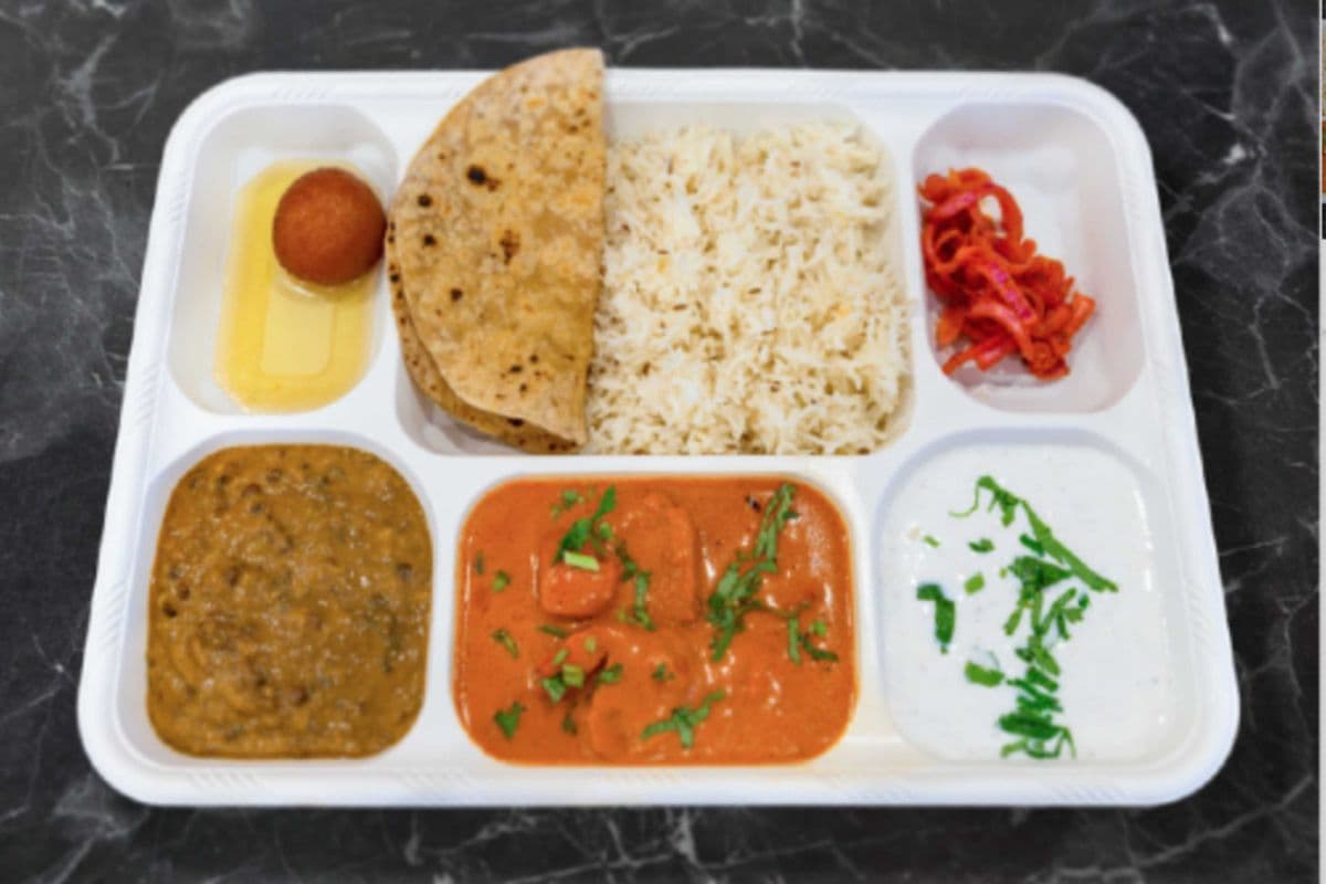 1 Non-Veg & 1 Veg Curry Combo with Soda Pop