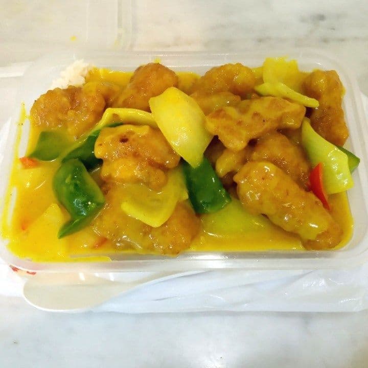 52. Cod Filet in Curry Sauce on Rice