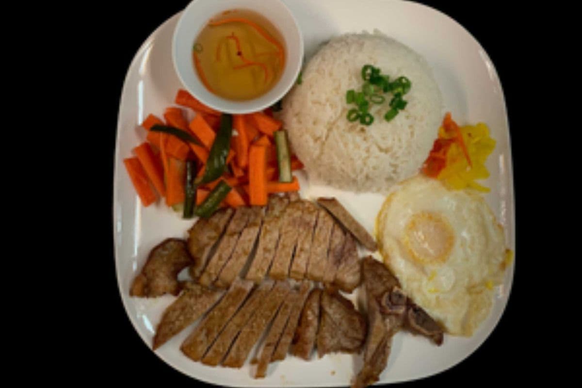 93. Grilled Pork Chop and Fried Egg on Rice