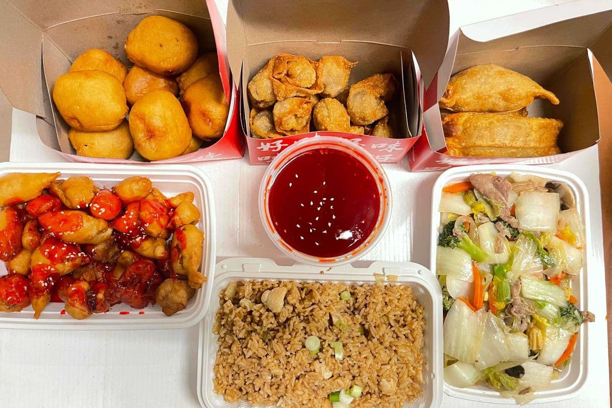 Dinner for 3 (3) egg rolls, (10-14) spare ribs, (9)balls, (12) wontons, beef greens, and 1 rice, 16 oz sauce