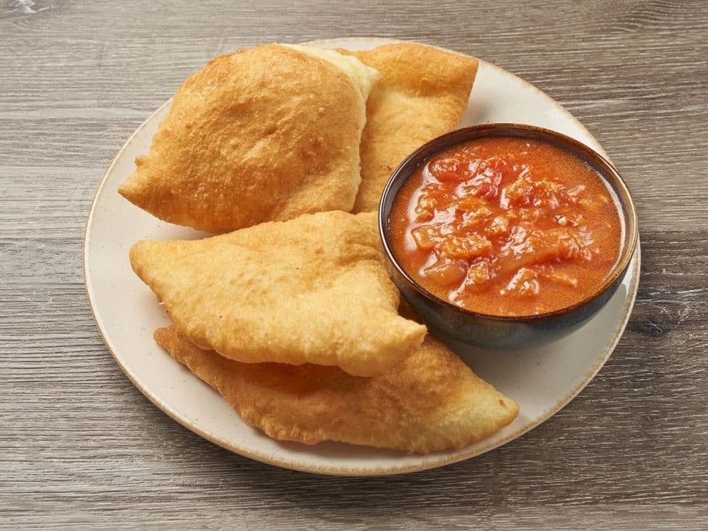 Bake & Tomatoes w/Saltfish