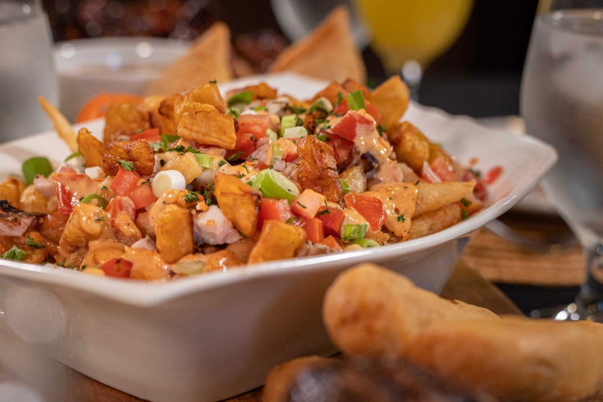 Jerked Chicken and Plantain Poutine