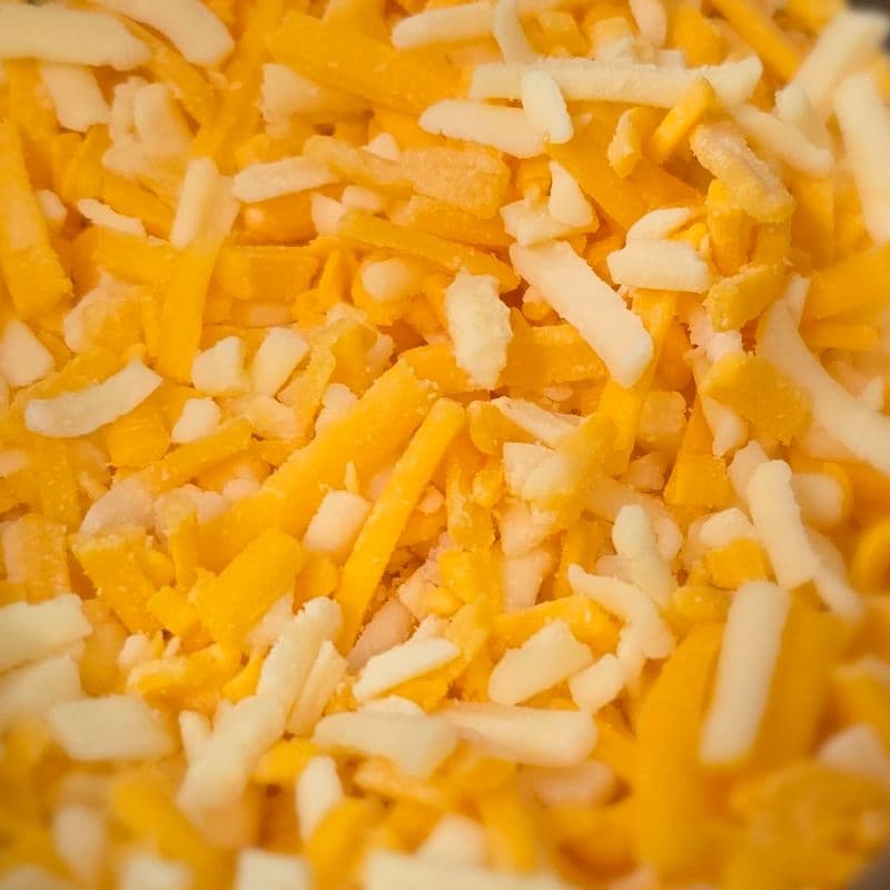 Add Shredded Jack & Cheddar Cheesr