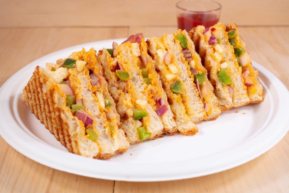 Paneer Schezwan Club Sandwich