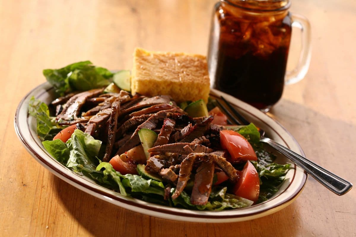 Sliced Brisket on Greens