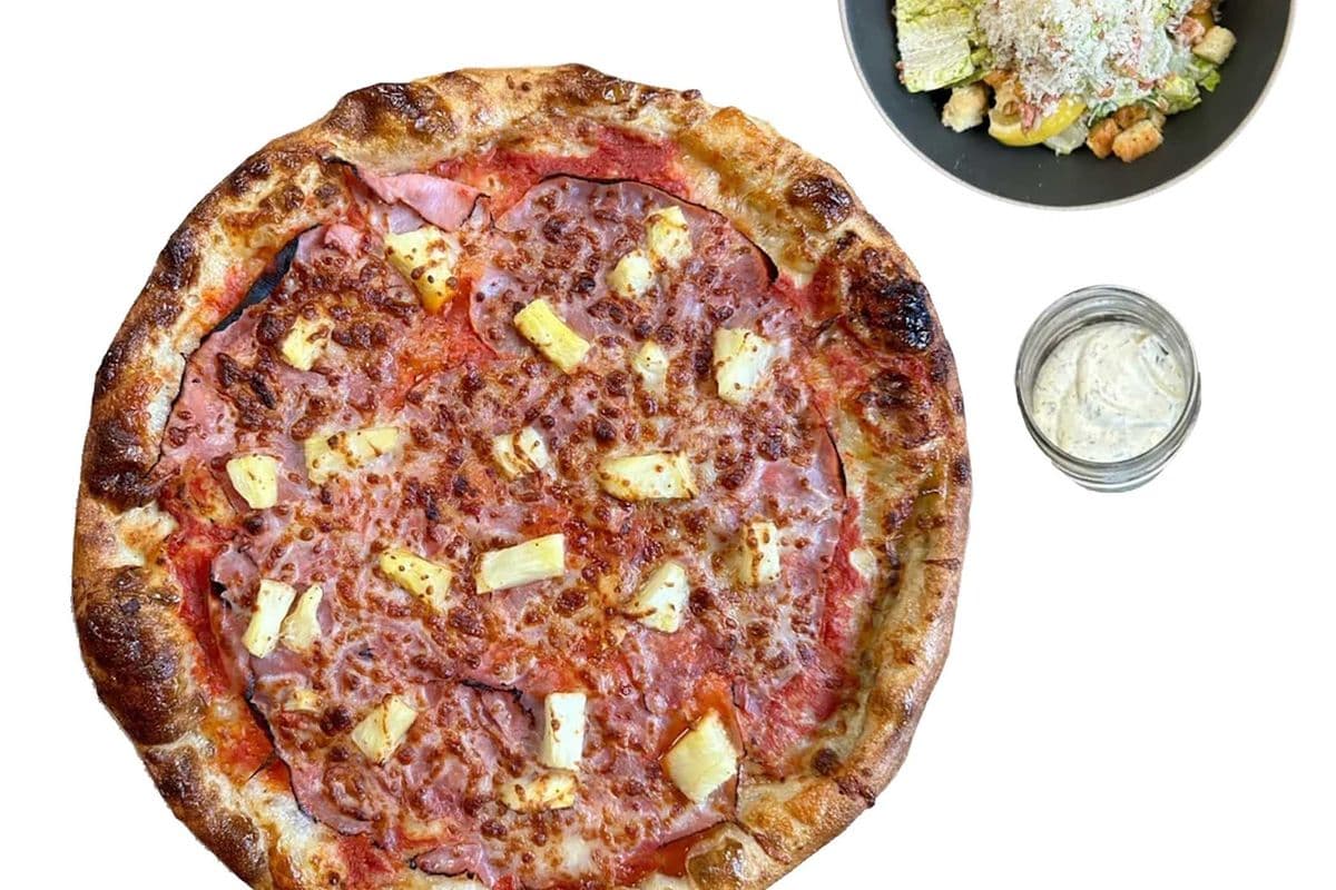 Bundle for 2-4: one 16" NYC Pizza, a Crusty Dip, choice of CHAR Caesar Salad or 9 Spice Chicken Wings