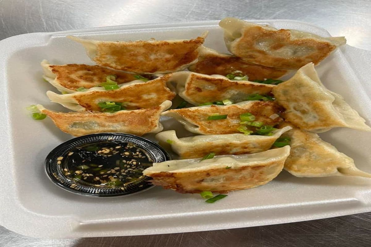D1. Pork and Cabbage Dumplings Pot Sticker (12 pcs)