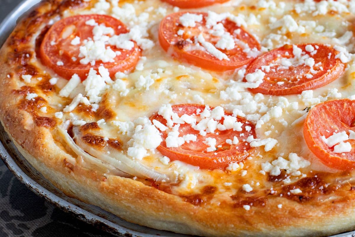 #23 Fresh Tomatoes, Feta Cheese, and Onions Pizza
