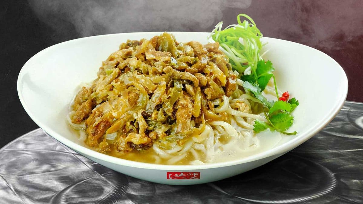A12. Preserved Radish and Shredded Pork with Noodle in Clear Beef Soup