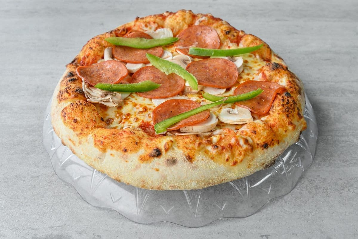 2 Pizzas larges toute garnie / 2 Large All Dressed Pizzas