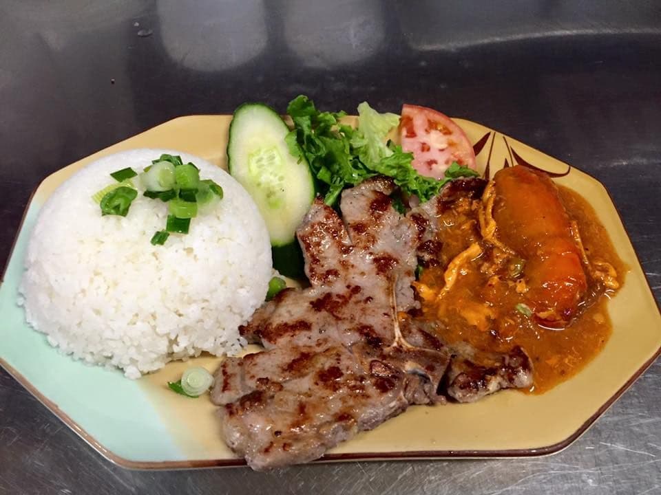 516. Vietnamese Style Well Cooked Jumbo Shrimp with Grilled Pork Chop on Rice