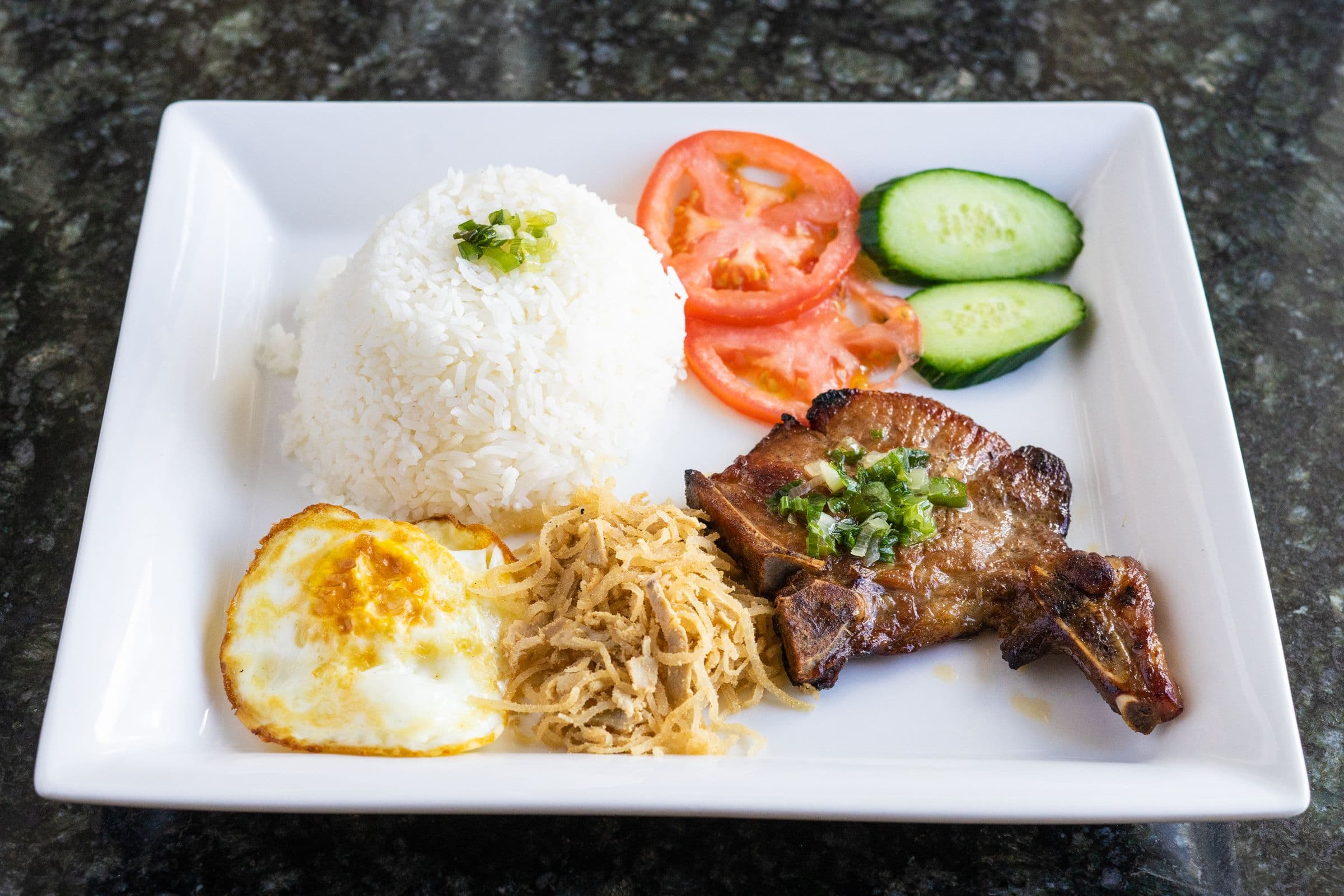 55. Shredded Pork, Eggs, Charbroiled Pork Chops (1 pc) on Steamed Rice - Com Bi Trung Chien Suon Nuong