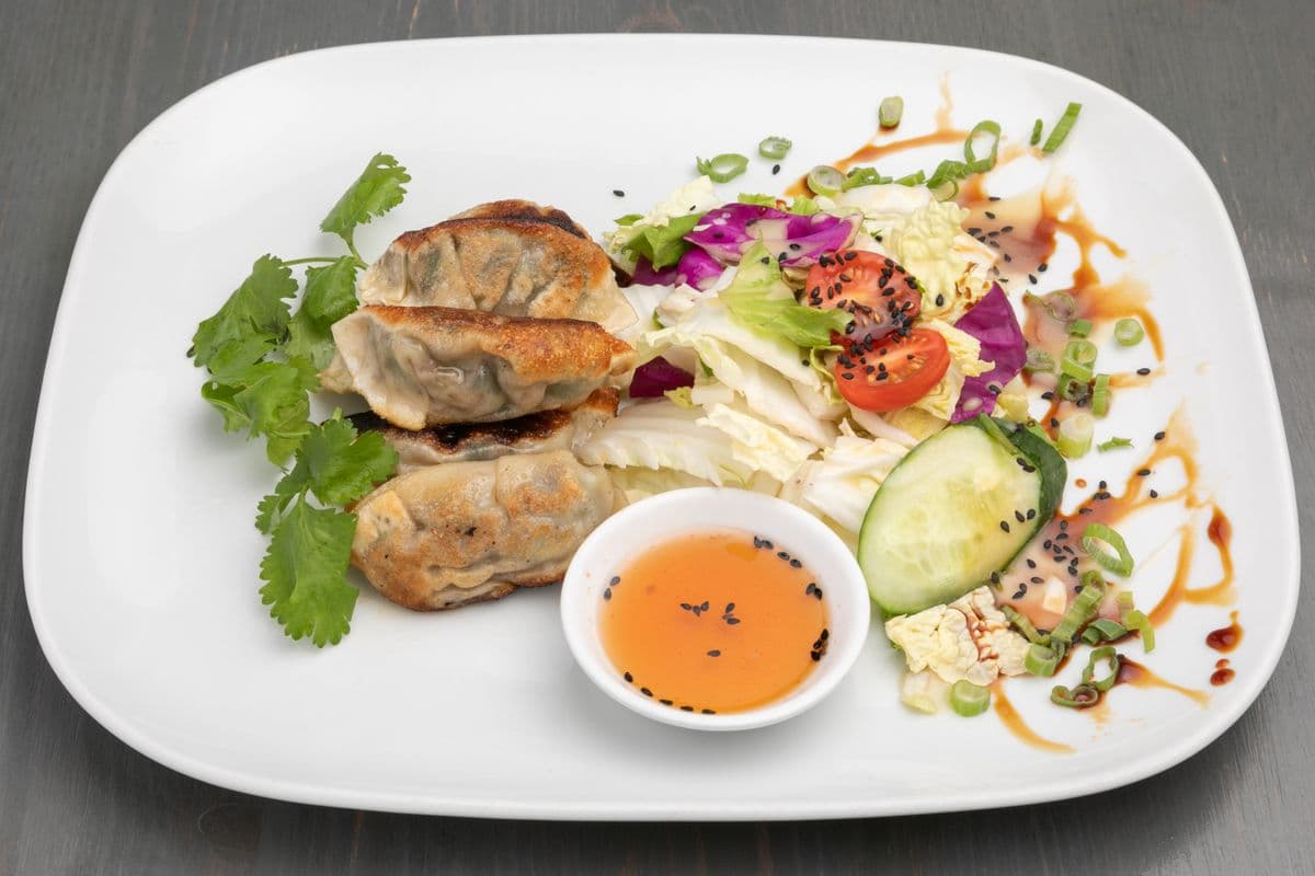 10. Dumplings au canard (4 mcx) / Duck Dumplings (4 pcs)