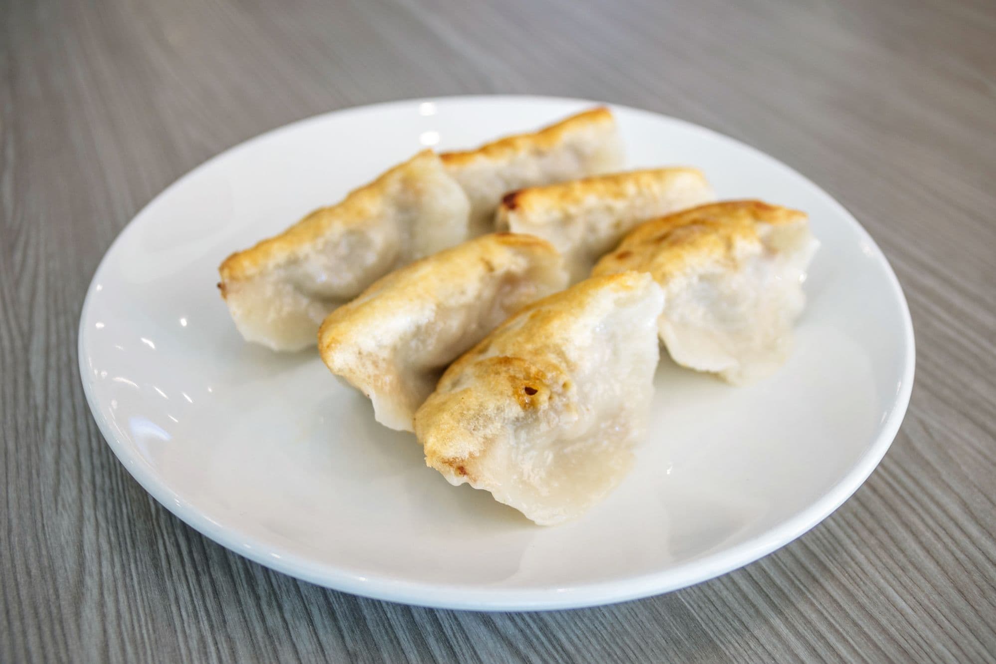 9. Grilled Pork and Vegetable Dumplings (10 pcs) 菜肉鍋貼