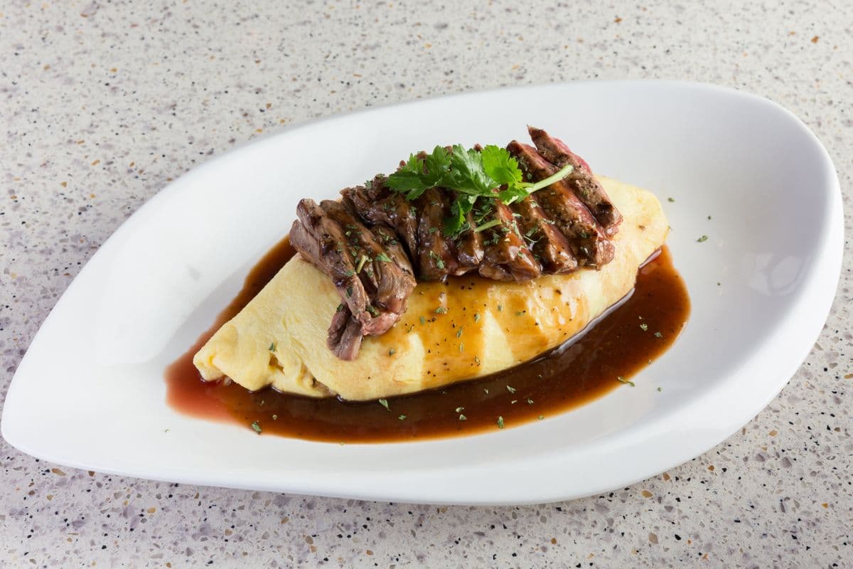 D03. Beef Striploin Steak Omurice with Black Pepper Sauce
