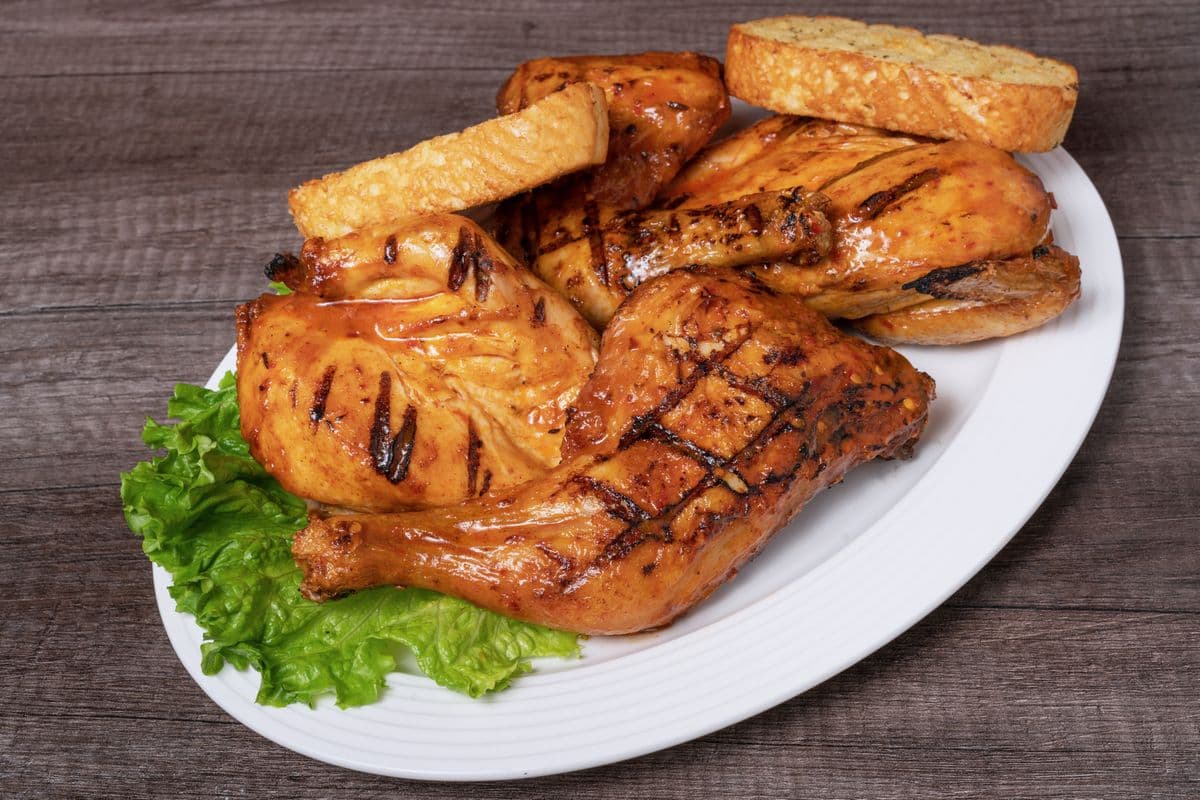 One Whole Char-Grilled Family Chicken + 1 Large Side + 2 Garlic Breads
