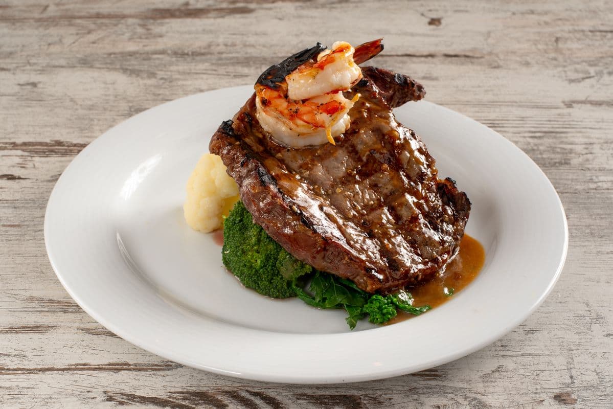 Ribeye Steak (12 oz.) with Gambas, Potatoes, and Vegetables