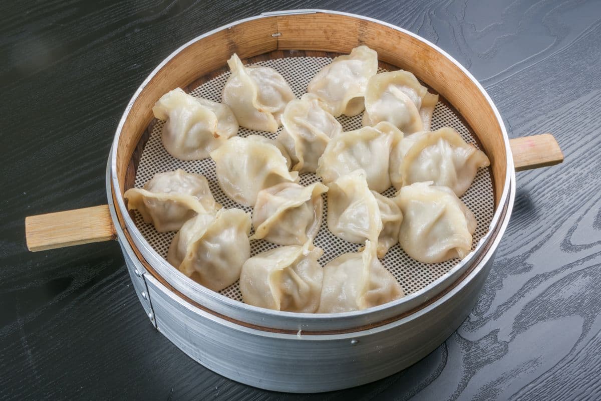 25. Dumplings au porc et aux oignons verts / Pork and Green Onion Dumplings(12pcs)